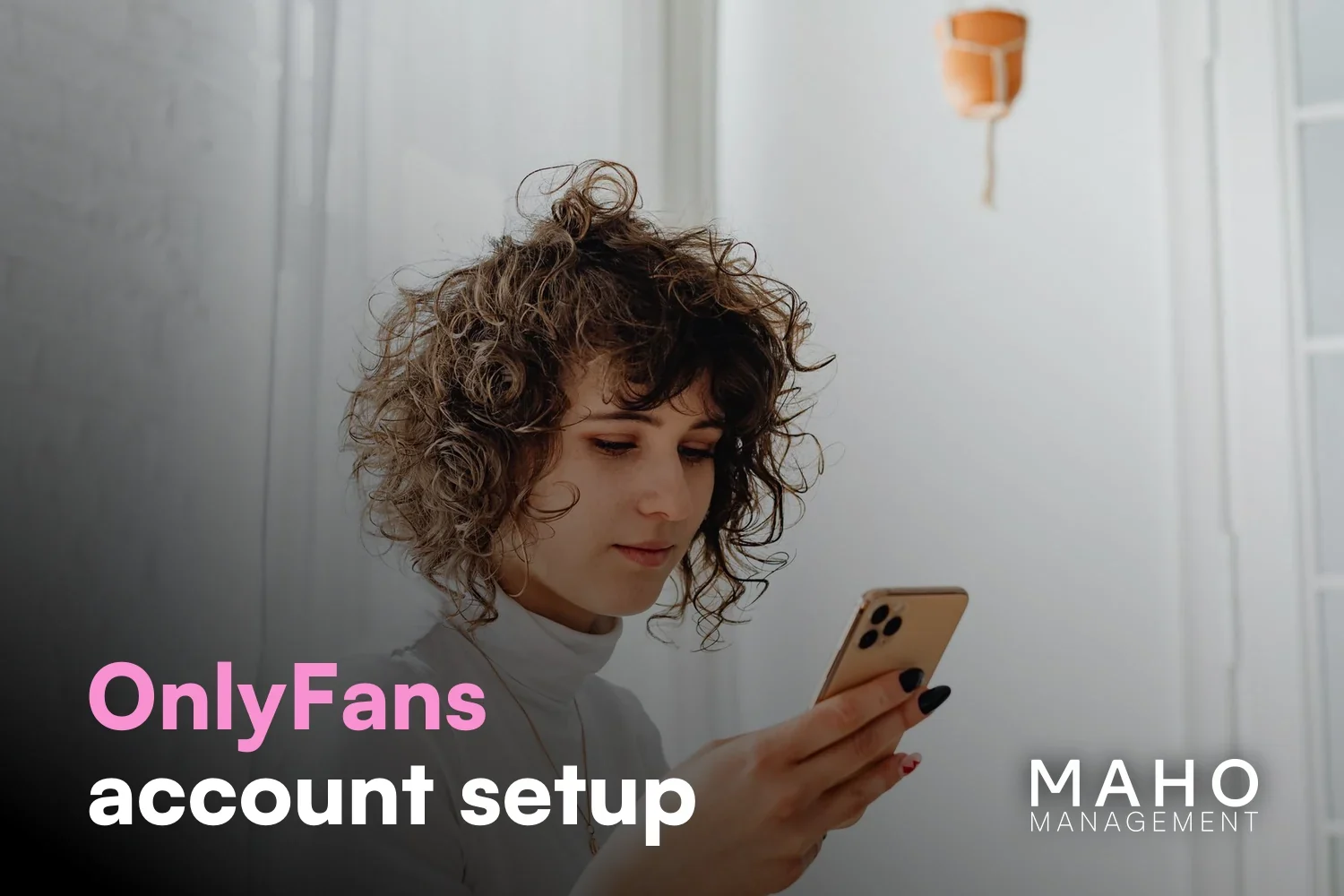 Creator with curly hair setting up her profile on her phone – creating an OnlyFans account